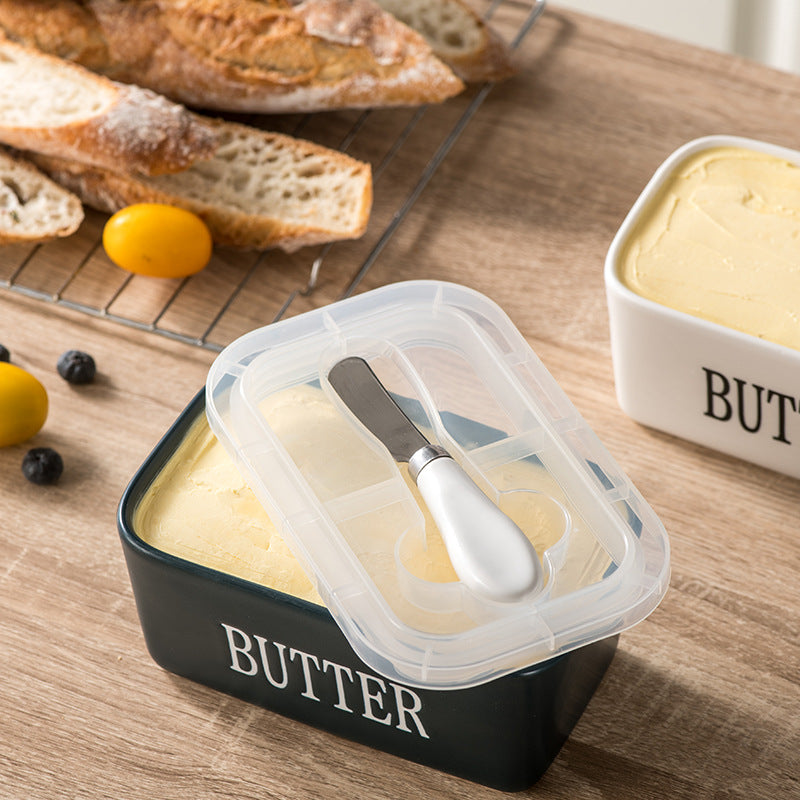 Butter dish with butter knife
visable butter box